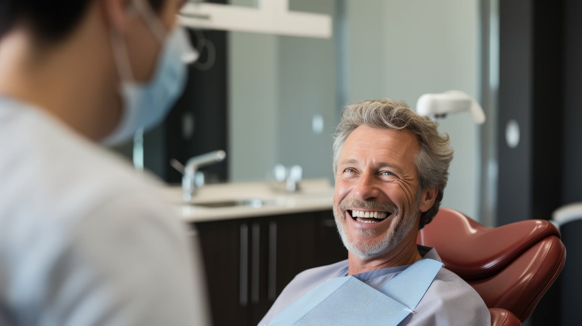 Dentist performing an oral exam at Calgary South Dental in SE Calgary